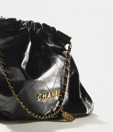 shiny black chanel bag|Waist bag, Shiny calfskin & gold.